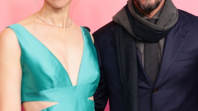 Keanu Reeves' girlfriend, 54, faces mixed reactions after posing in teal cut-out dress on red carpet