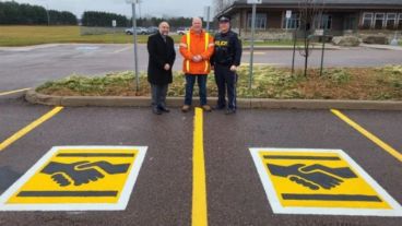 Here’s what a handshake symbol on a parking space means