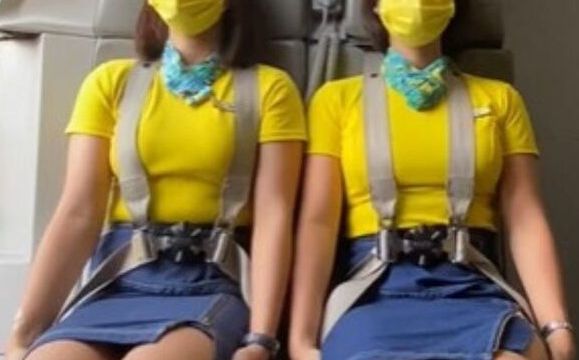 HT1. Flight attendant shares a ‘scary’ explanation for why they sit on their hands during take-off and landing
