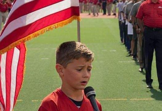 HT1. Emotional impact: 10-year-old wows with national anthem, brings tears to grown men