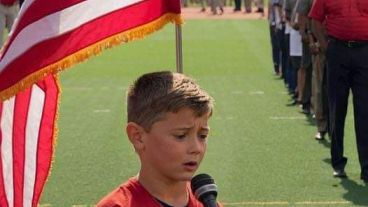 HT2. Emotional impact: 10-year-old wows with national anthem, brings tears to grown men