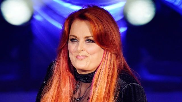 HT4. Fans Notice Wynonna Judd, 60, ‘Lost Too Much Weight’ as She Flaunts ‘Skinny’ Look in Black Plunging Outfit